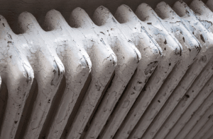 Closeup of an old cast iron radiator