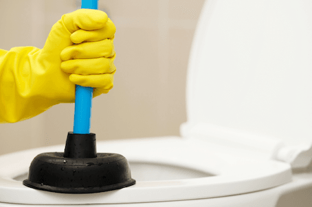 Repairing toilet with hand plunger