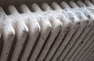 Closeup of an old cast iron radiator